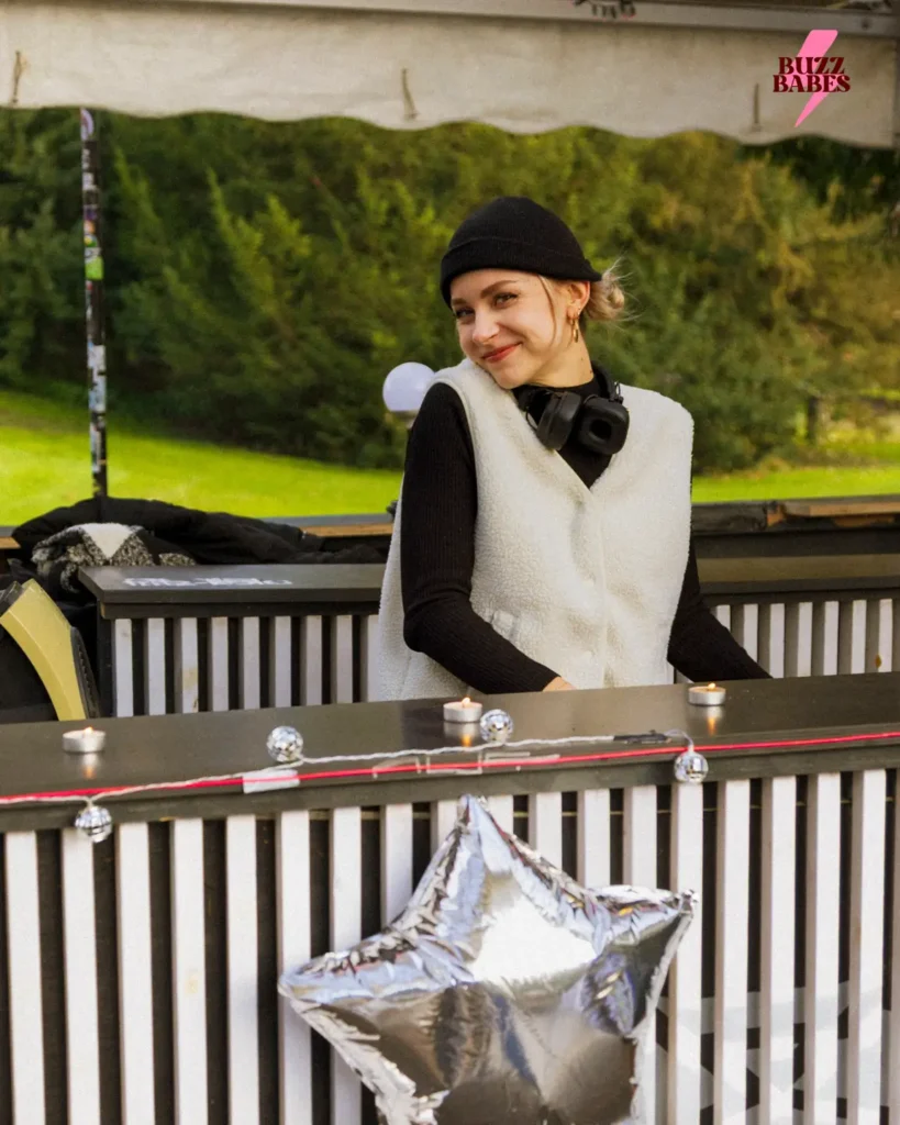 DJ performing at a Buzz Babes outdoor music event